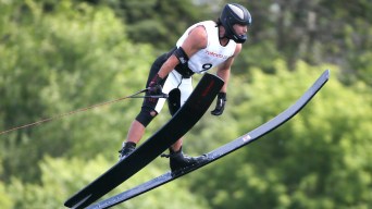 Ryan Dodd of Olds, Alberta jumps to the gold medal in jumps competition in waterskiing at the Pan American Games in Toronto
