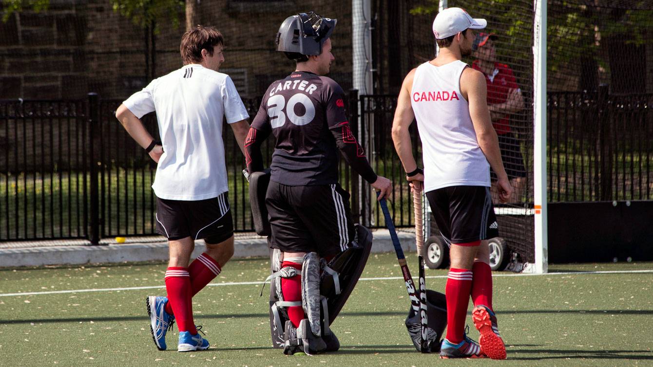 Canadian goalkeeper David Carter looks on with teammates during a training session in Toronto (Photo: Field Hockey Canada).