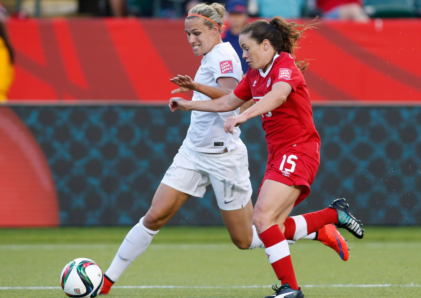 Allysha Chapman (right) challenges Hannah Wilkinson leading to a penalty at the FIFA Women's World Cup on June 11, 2015. 