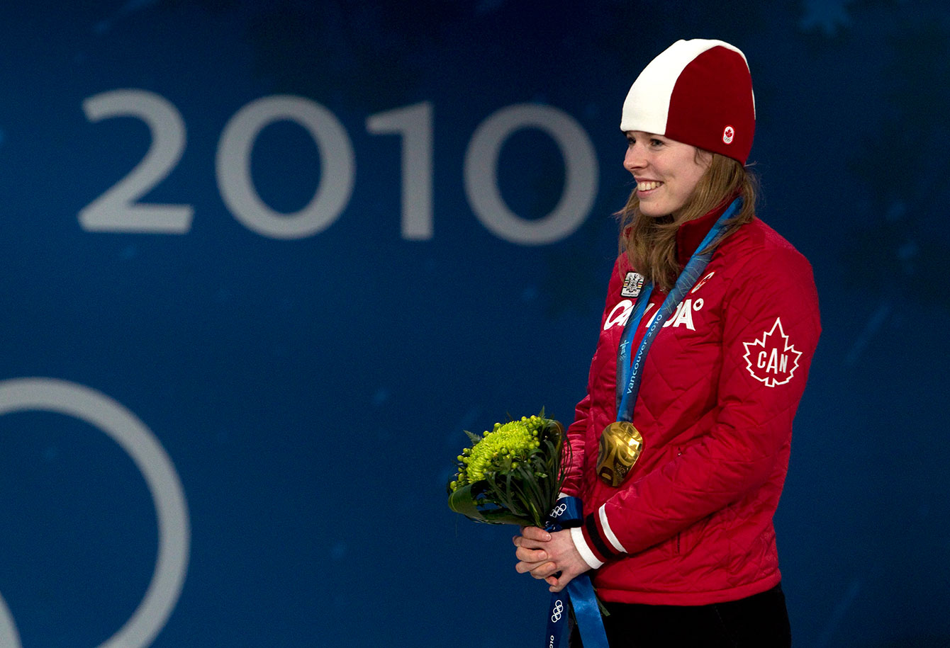 Christine Nesbitt stands on the podium at her 1000m victory ceremony, February 18th, 2010. 