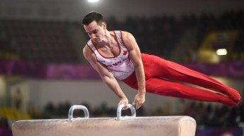 Zachary Clay of Canada competes in mens artistic gymnastics