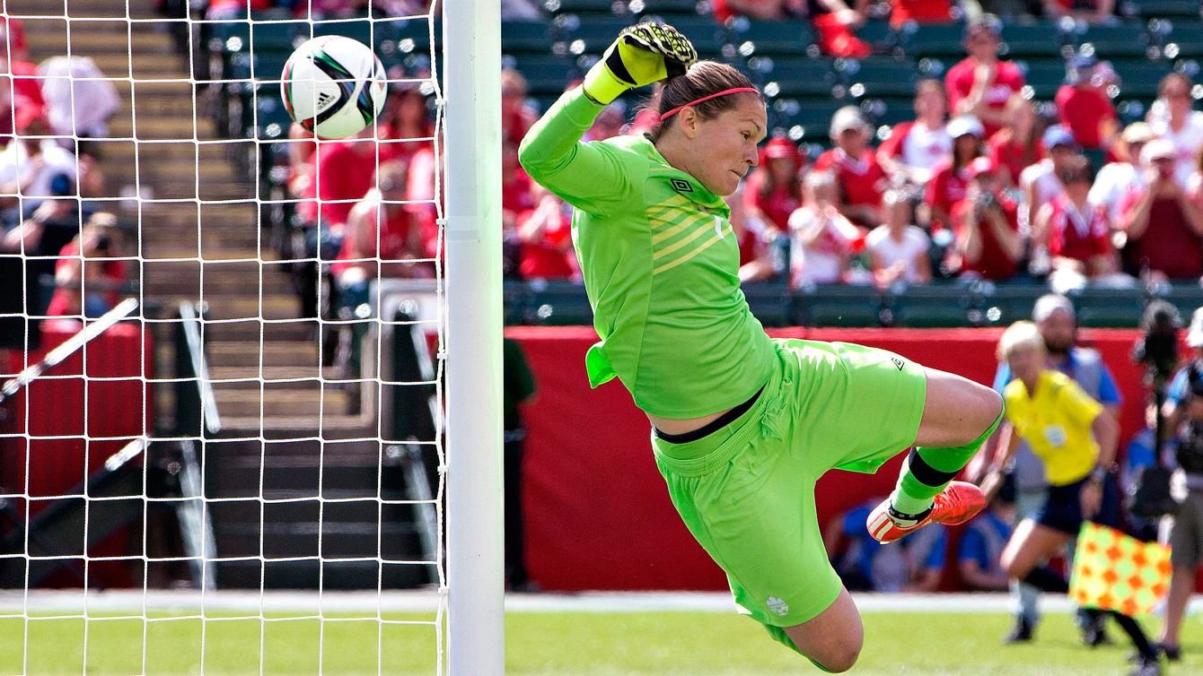 Canada goalkeeper Erin McLeod is beaten by a Wang Lisi free kick, but rescued by the uprights during FIFA Women's World Cup on June 6, 2015.