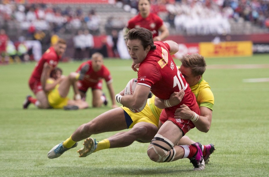 Canada's Pat Kay scores a try