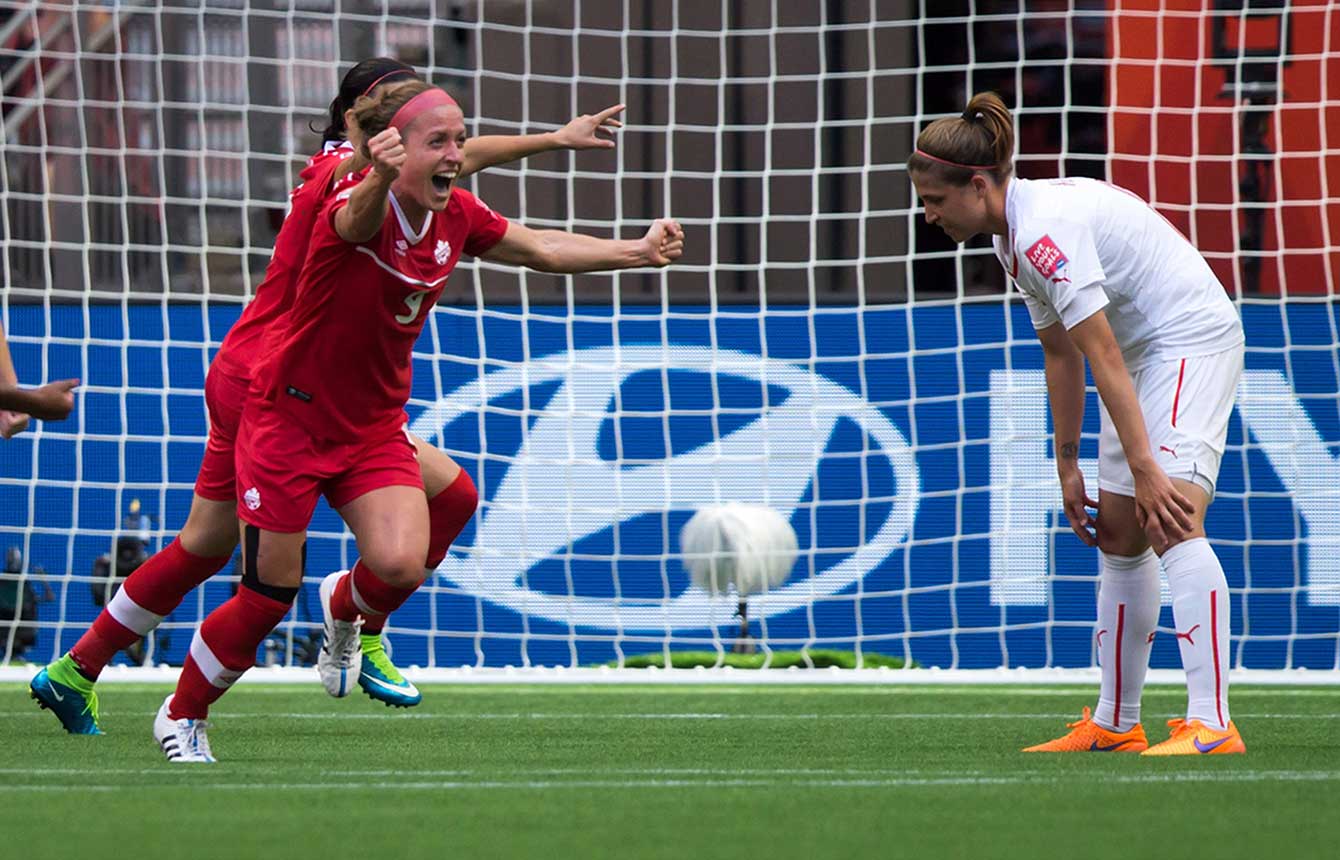 Josée Bélanger (no. 9) celebrates what would be the winning goal at the FIFA Women's World Cup against Switzerland in the Round of 16 on June 21, 2015 in Vancouver.