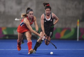 Maddie Secco battles opponent for ball