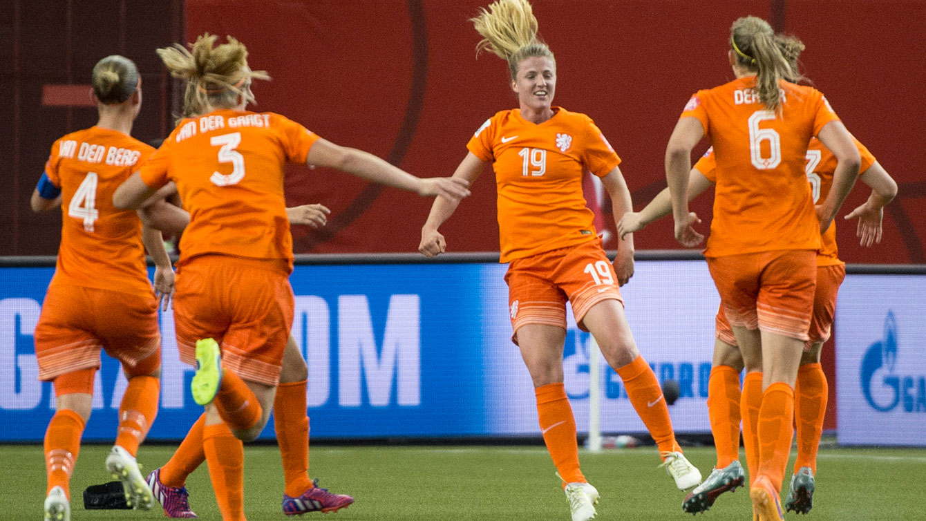 Netherlands players celebrate the Kirsten van de Ven (19) equalizer against Canada at the FIFA Women's World Cup on June 15, 2015.