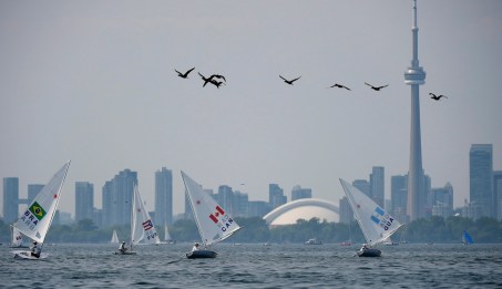 Canada's Lee Parkhill races his laser sail boat against other countries during the first race at the Pan American Games in Toronto on Sunday, July 12, 2015. Photo by THE CANADIAN PRESS/Nathan Denette