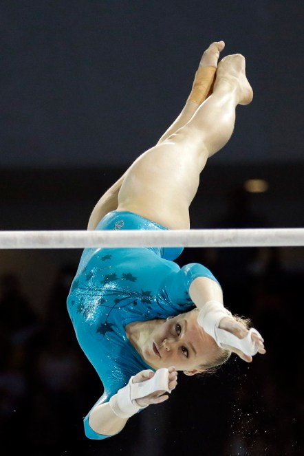 Canada's Ellie Black performs on the uneven bars during women's artistic gymnastics all-around competition in the Pan Am Games in Toronto, Monday, July 13, 2015. Black won the gold medal in the event. (AP Photo/Gregory Bull)