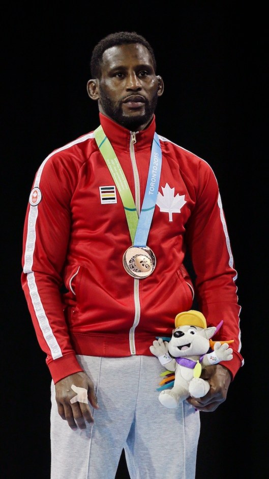 Haislan Garcia poses with his bronze medal