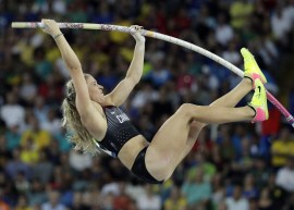 Kelsie Ahbe jumping bar at Rio 2016
