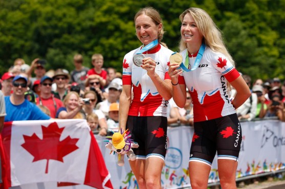 Emily Batty and Catharine Pendrel with their medals