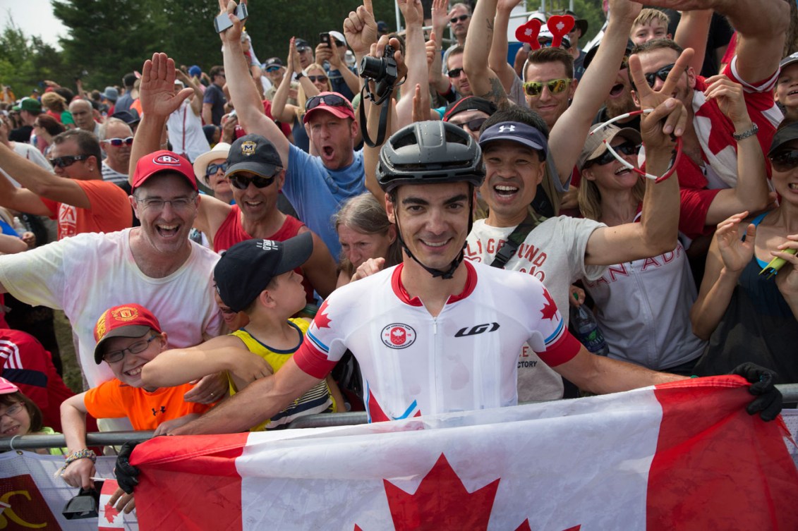 Raphaël Gagné celebrates his mountain bike gold with the Canadian fans who cheered him to victory.