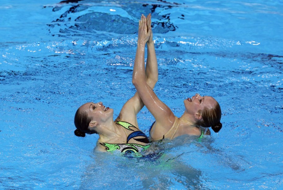 Karine Thomas and Jacqueline Simoneau of Canada compete in the Synchronized Swimming Duet Free Routine