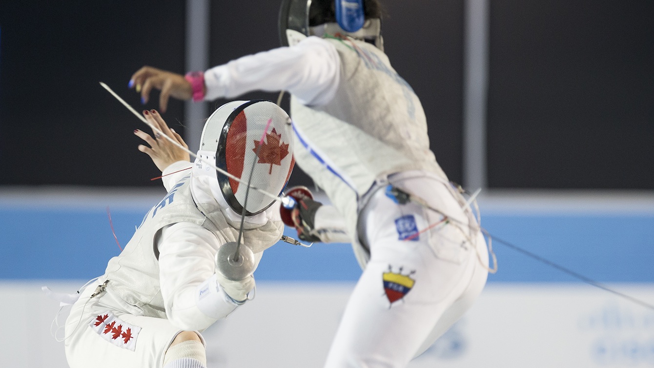 Fencer with Canadian flag on uniform 