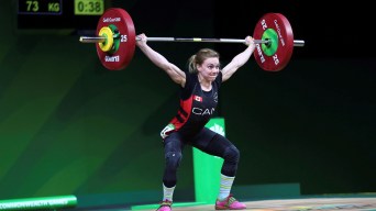 Canada's Amanda Braddock competes during women's 48kg weightlifting final at the Commonwealth Games in Gold Coast, Australia, Thursday, April 5, 2018. (AP Photo/Manish Swarup)