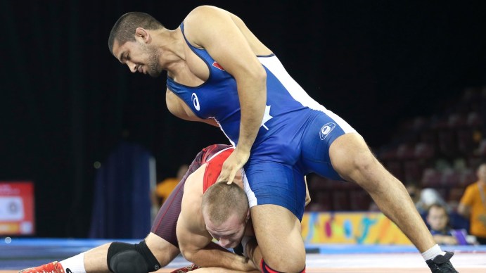 Arjun Gill (blue) of Surrey, B.C. was the silver medalist in the freestyle wrestling preliminaries at the PanAmerican Games in Mississauga, Ont., Saturday, July 18, 2015. Photo by Mike Ridewood