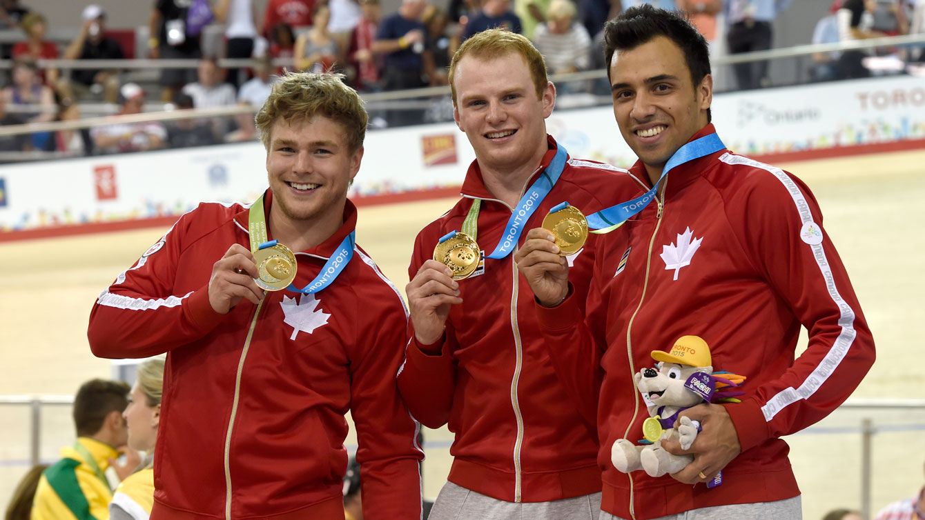 (L-R) Hugo Barrette, Evan Carey and Joseph Veloce with their Pan Am Games team sprint gold medals from July 16, 2015.
