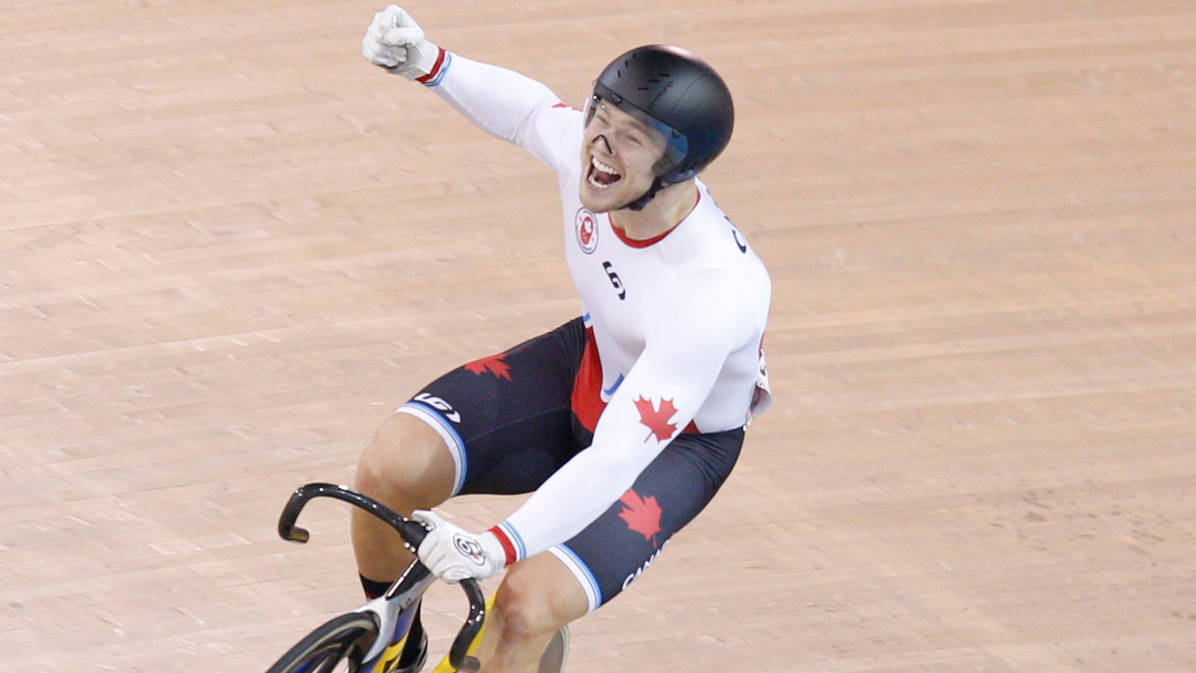 Hugo Barrette celebrates winning gold at the Pan Am Games in men's sprint on July 18, 2015.