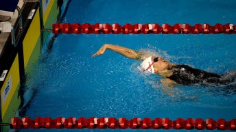 Hilary Caldwell Canada's Hilary Caldwell reaches for the wall to win the women's 200m backstroke.