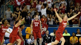 Team Canada's women's basketball team celebrates winning gold