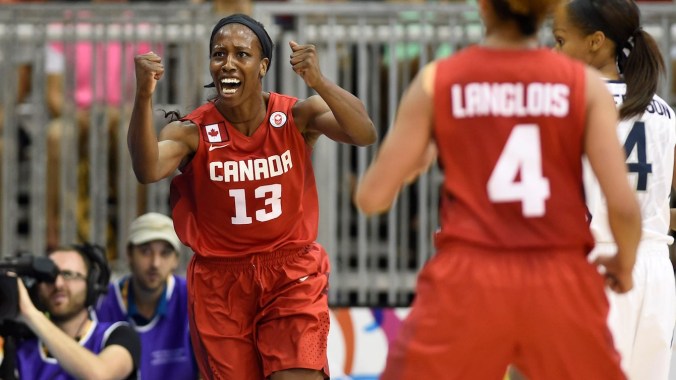 Team Canada's women's basketball team celebrates winning gold
