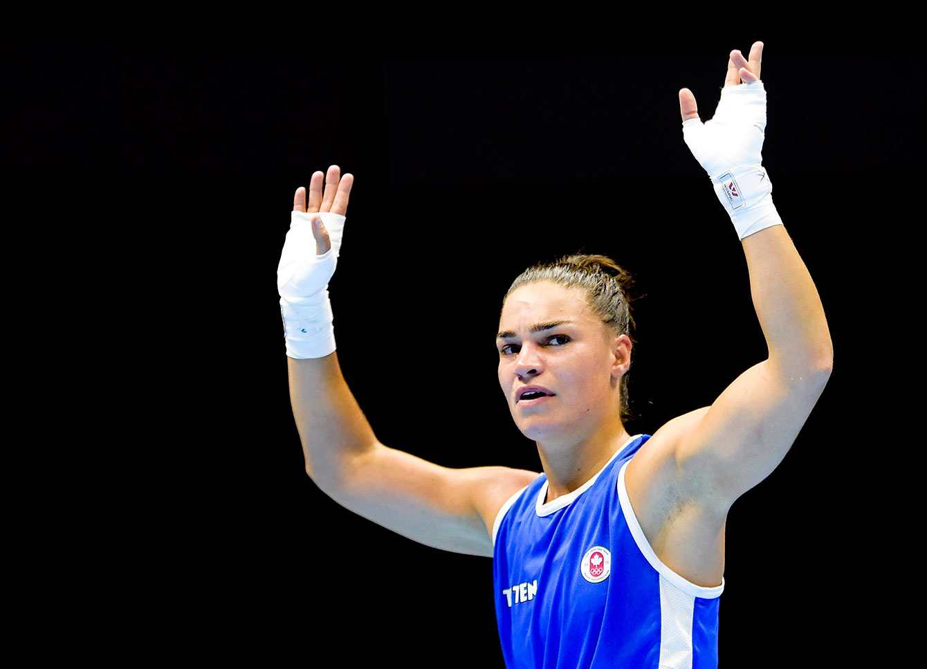 Caroline Veyre reacts after defeating Dayana Sanchez of Argentina in the women's 57-60kg lightweight gold medal boxing final during the Pan American Games.