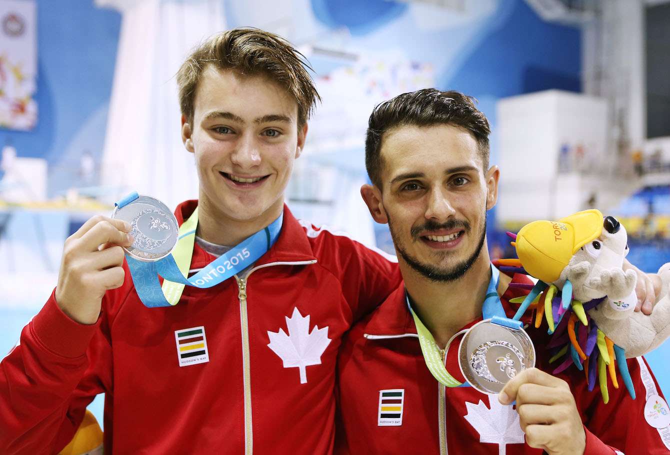 Philippe Gagne and Francois Imbeau-Dulac of Canada win Silver in the Men's 3m Synchro Final. Photo by Vaughn Ridley.