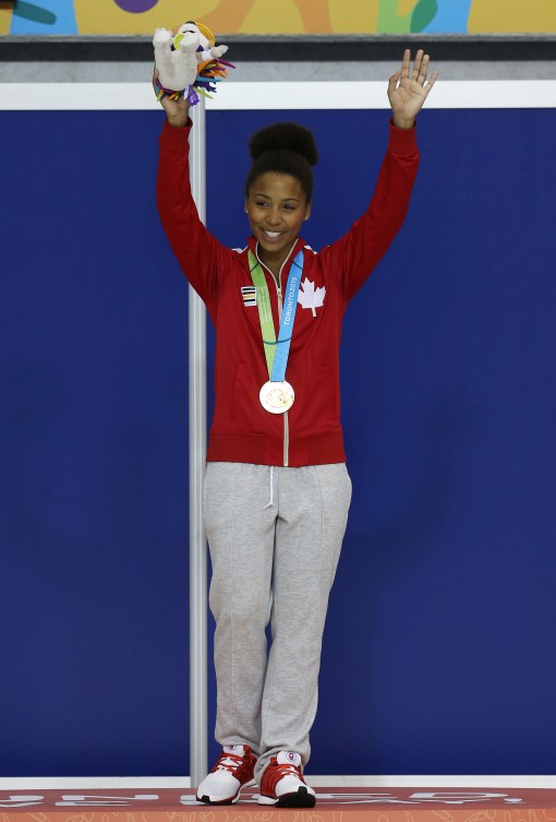 TORONTO, ON - JULY 12:  Jennifer Abel of Canada wins Gold in the Women's 3m Springboard Final during the Toronto 2015 Pan Am Games at the CIBC Aquatic Centre on July 12, 2015 in Toronto, Ontario, Canada.  (Photo by Vaughn Ridley/Canada Diving)