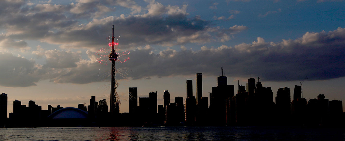 Fireworks sizzle around the CN Tower during the Opening Ceremony of the Toronto 2015 Pan American Games.