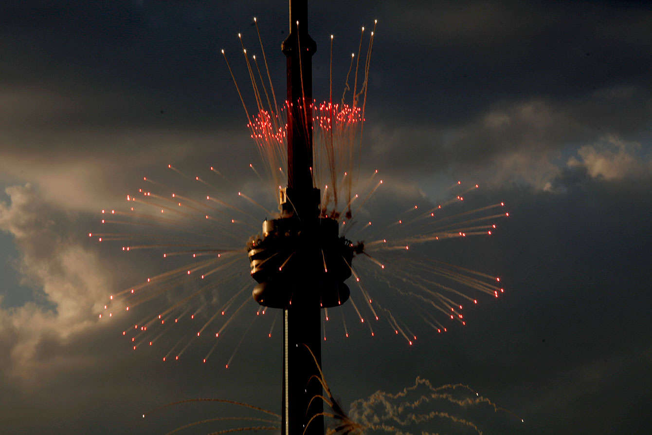 Toronto's most recognized landmark, the CN Tower, lights up for the Opening Ceremony of the Pan American Games on July 10, 2015 (Photo: Michael P. Hall/COC). 