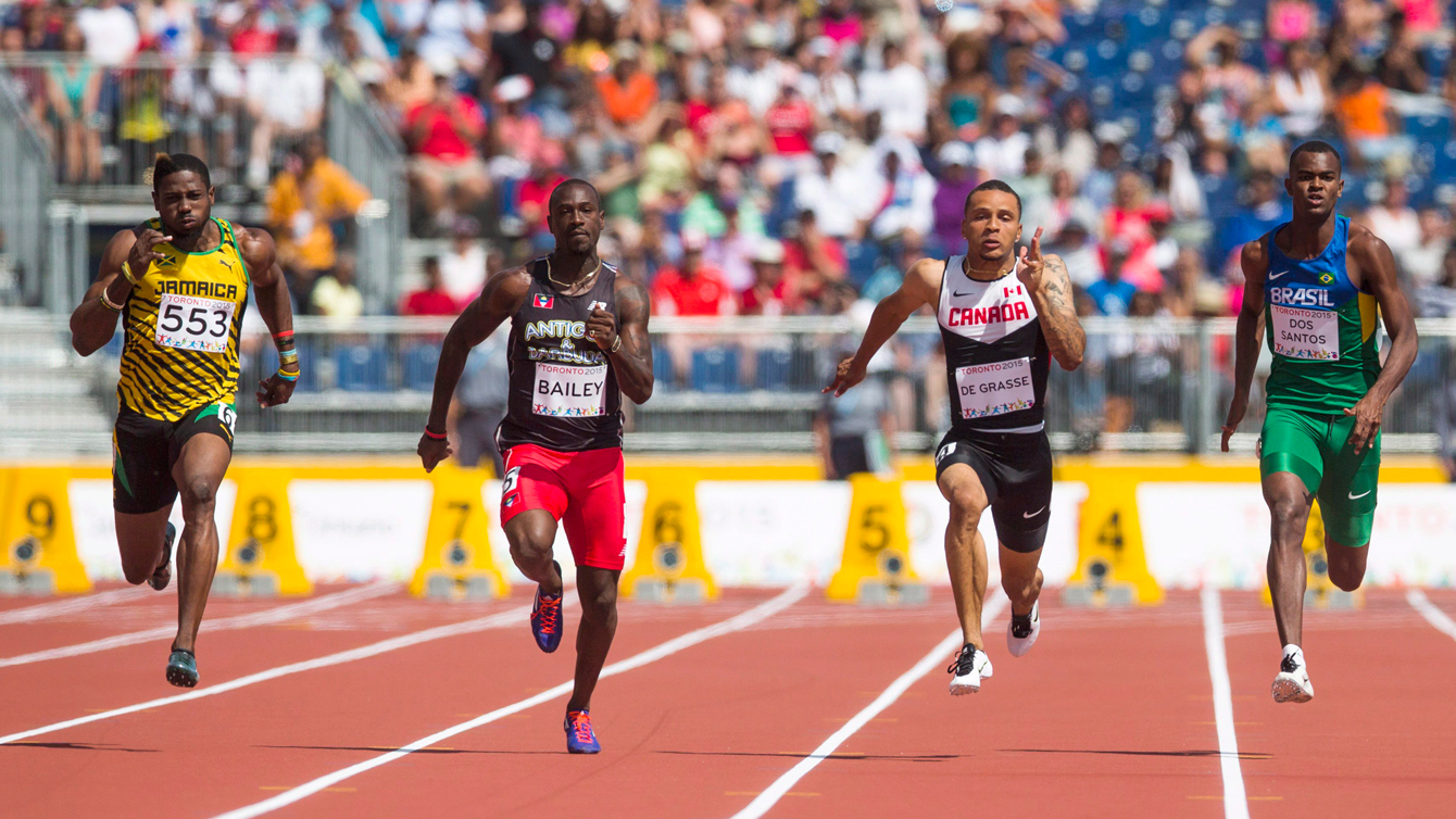 Andre De Grasse (second from right) competes in the 100m quarterfinals at Pan Am Games on July 21, 2015.
