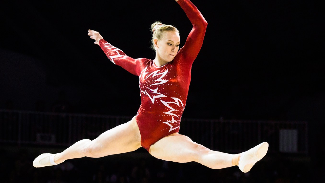 Ellie Black Leaping in the air in splits