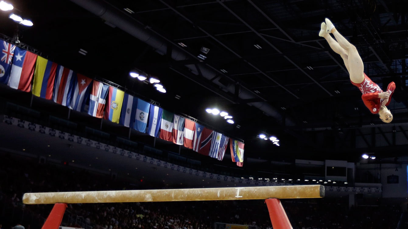 Ellie Black competes on beam at Toronto 2015.