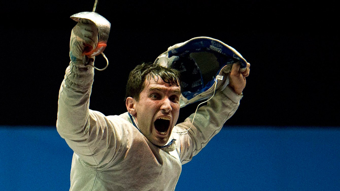 Philippe Beaudry reacts after winning the gold medal in men's Sabre Individual fencing at the 2011 Pan Am Games