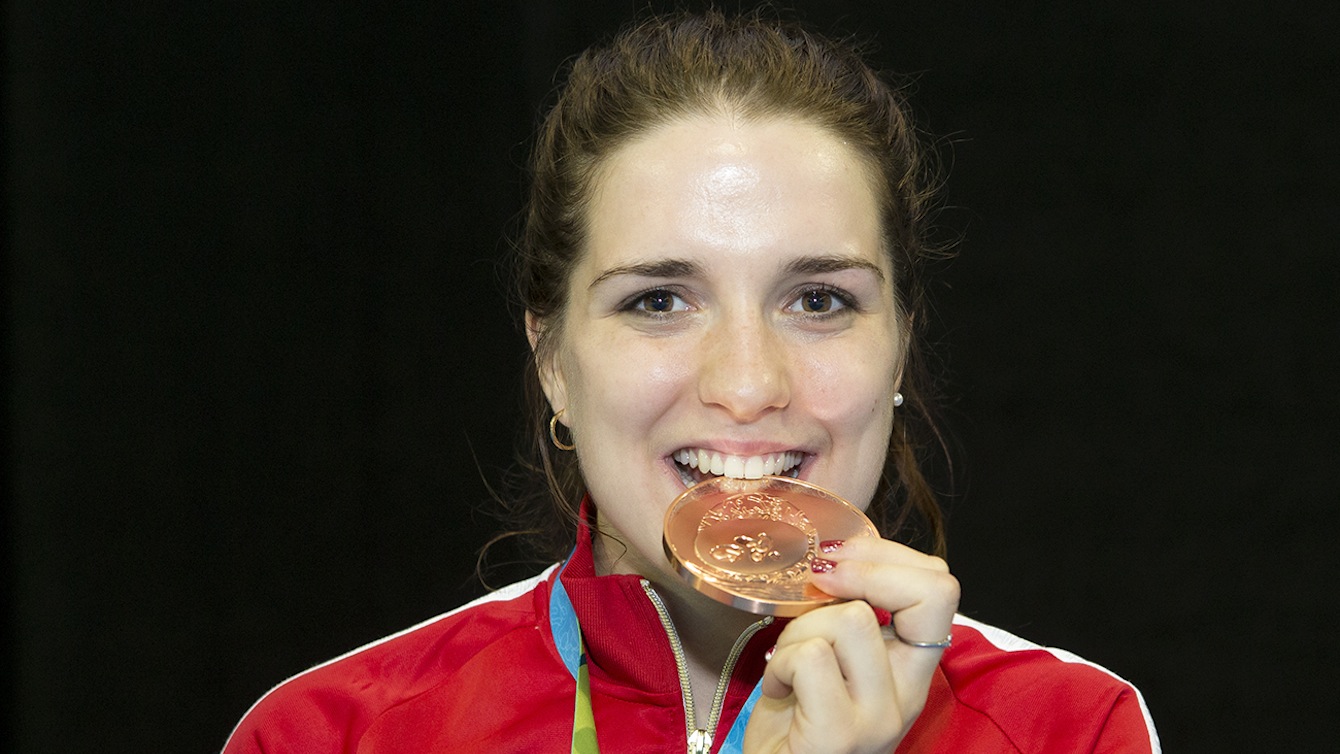Gabriella Page celebrates a Bronze medal in Women's Sabre at the Pan-American Championships