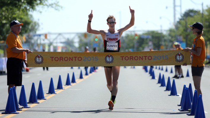 Evan Dunfee - TO2015 Evan Dunfee wins 20km racewalk Pan Am Games gold in stifling heat (COC photo by Greg Kolz).