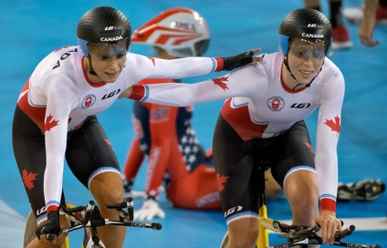 Allison Beveridge (right), Jasmin Glaesser celebrate their win in the women's team pursuit at the Pan American Games in Milton, Ontario on July 17, 2015 (COC Photo by Jason Ransom).