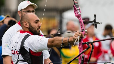 Canada's Jay Lyon competes in Team Archery at the 2015 Pan American Games in Toronto, Canada. Photo by Winston Chow