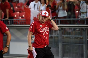 _JDR9768-(1) Harnett shows off some Team Canada swag while cheering on the rugby teams.