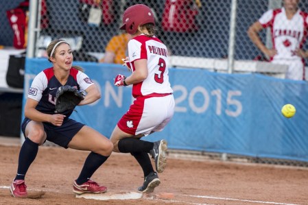 Erika Polidori safely makes it to first base in the game against the United States on July 24, 2015 (Jeffrey Sze/COC)