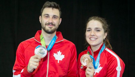 Joseph Polossifakis and Gabriella Page Joseph Polossifakis and Gabriella Page pose with their medals
