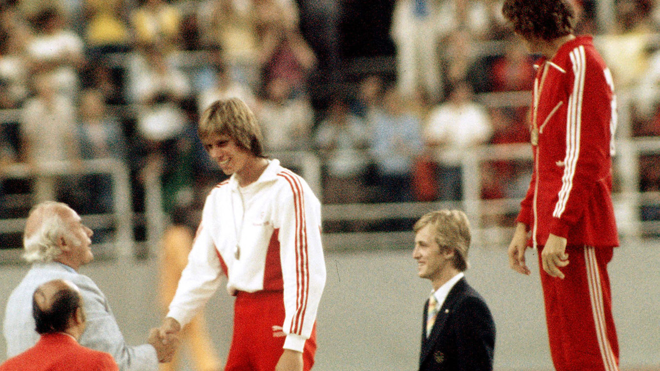Then 20, Greg Joy stands on the Olympic podium in Montreal after winning silver in the high jump on July 31, 1976. 