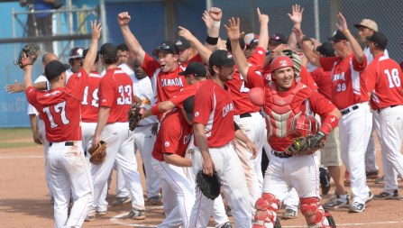 Canadian men's softball team takes gold in the final match against Venezuela. Photo by Winston Chow