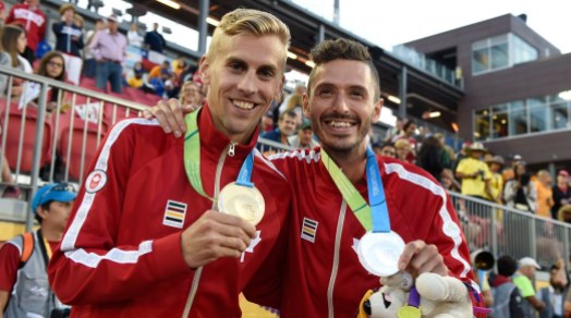 Matt Hughes and Alex Genest Matt Hughes and Alex Genest pose with their medals