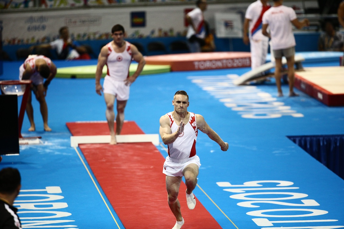 Scott Morgan competes in vault
