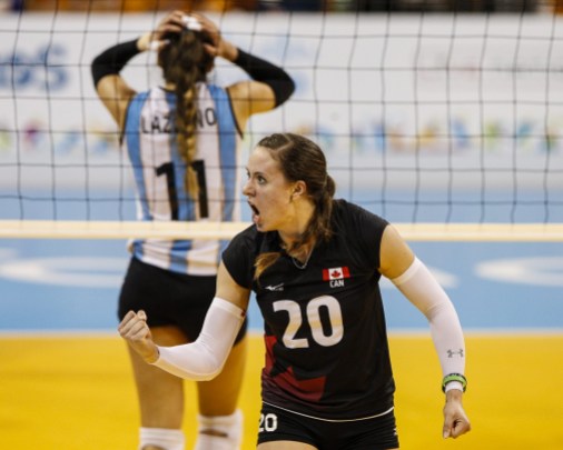 Women's volleyball - TO2015 Contrasting emotions after a women's volleyball point at TO2015 (COC Photo by Michael P. Hall).