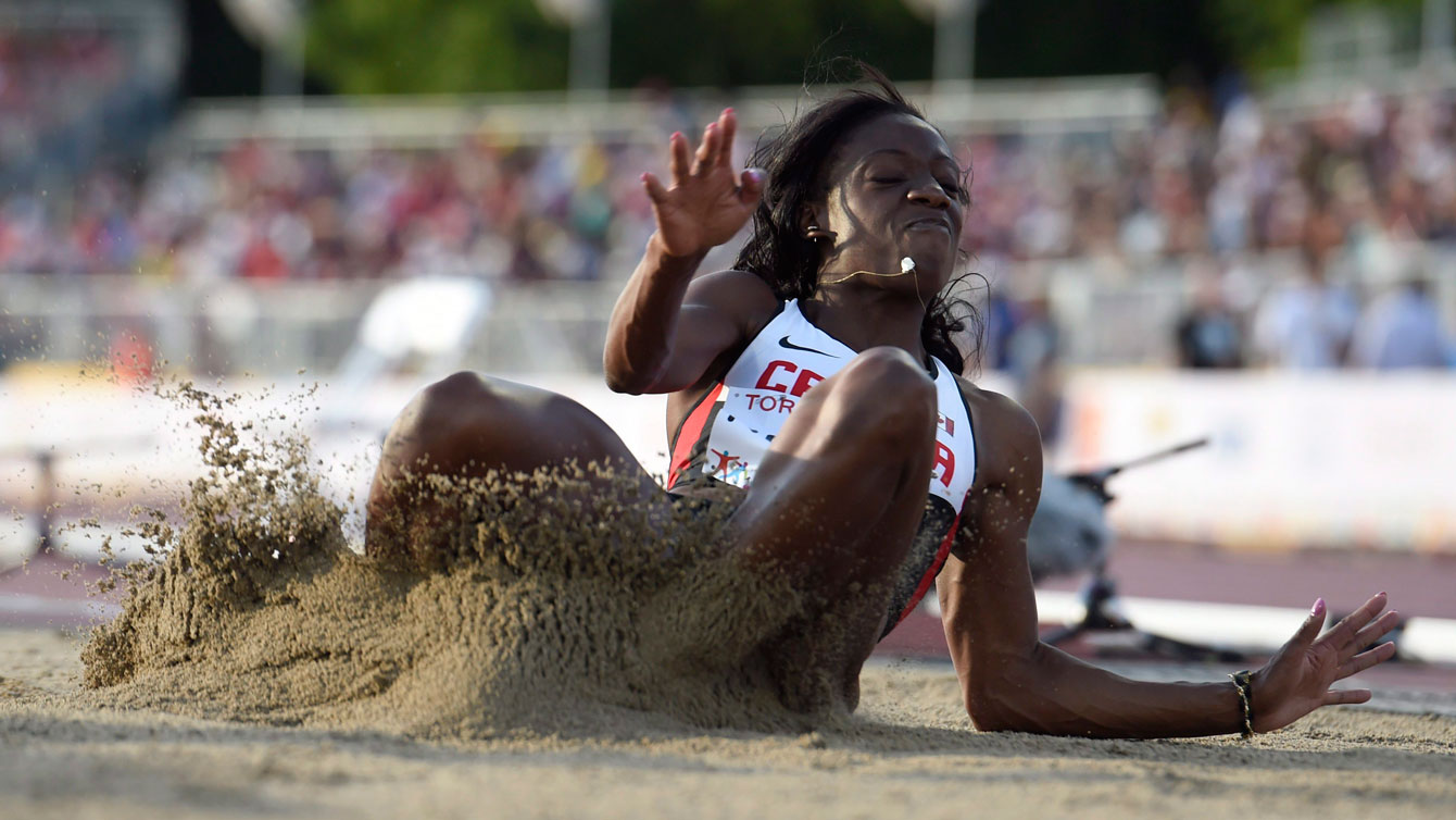 Christabel Nettey lands during one of her long jumps at the Pan Am Games in Toronto on July 24, 2015.
