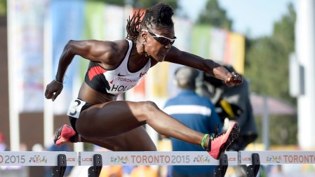 Nikkita Holder competes in the women's 100m hurdles event