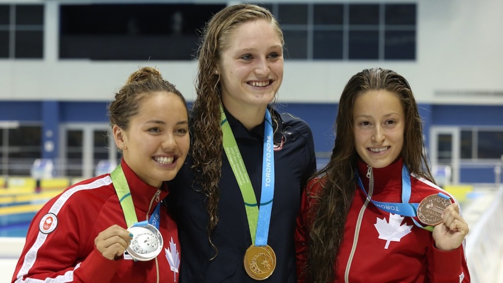 Noemie Thomas and Katerine Savard take silver and bronze in the Women's 100m Butterfly event