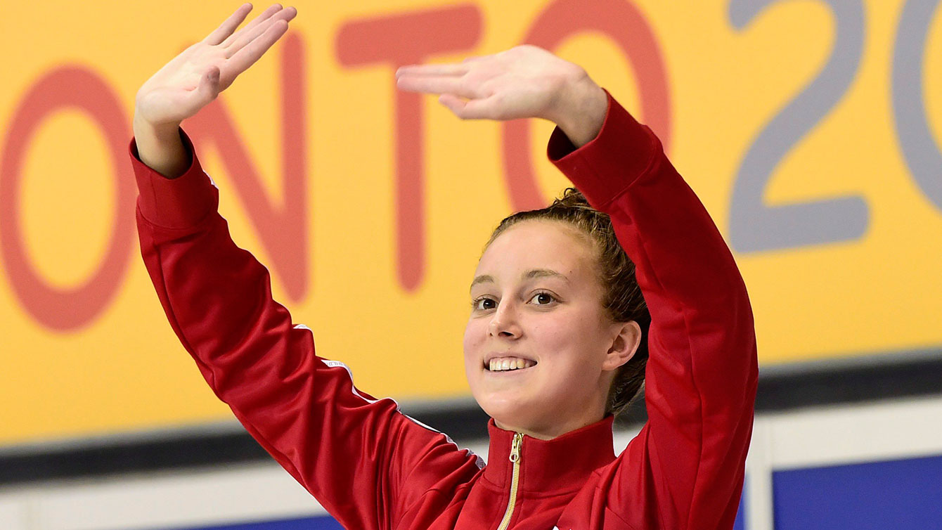 Emily Overholt waves to the crowd after winning Pan Am Games gold on July 17, 2015. 